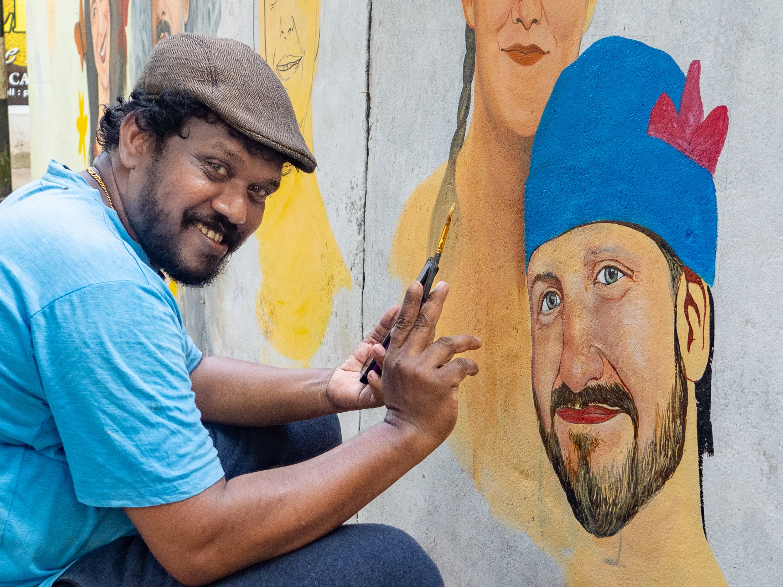 Alte Mauern werden bunt – Artist Harshan aus Kovalam in Kerala Südindien